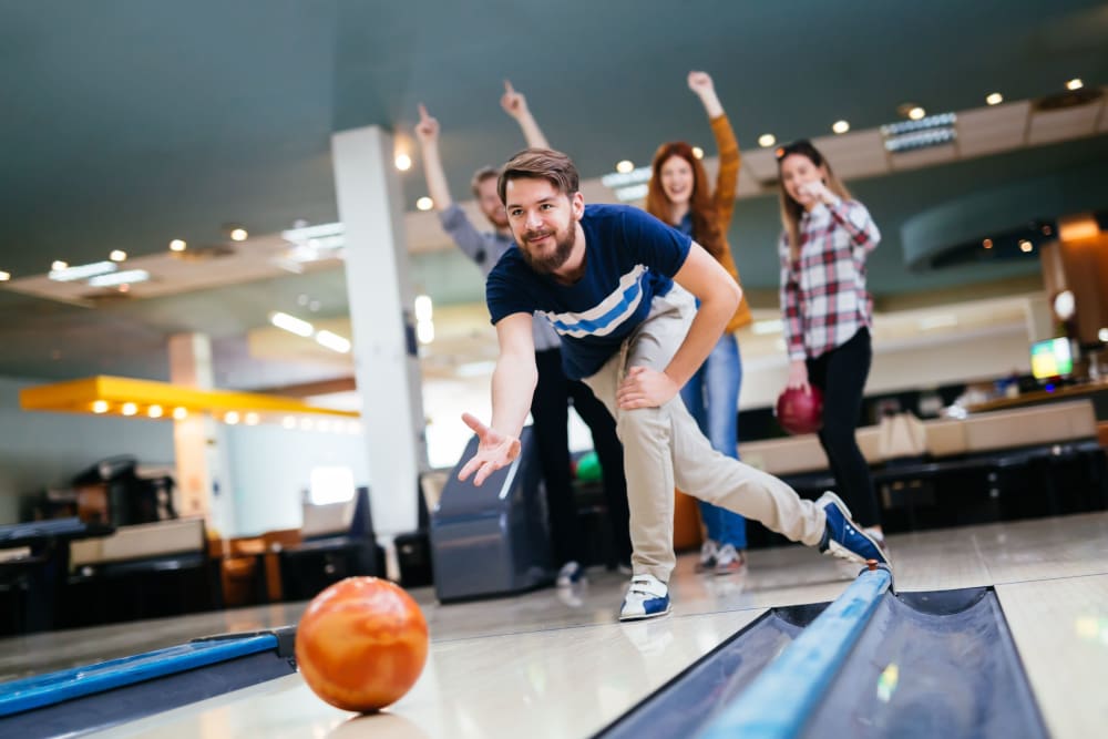Residents bowling near HERE Minneapolis in Minneapolis, Minnesota