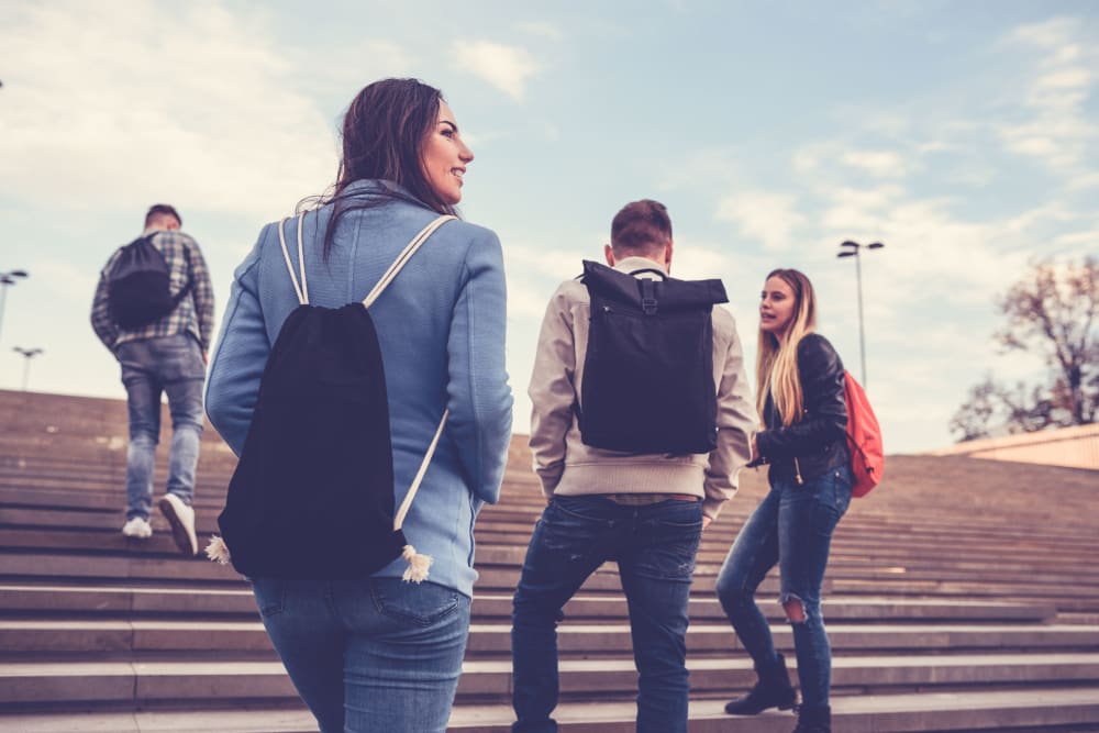 Friends walking to school in State College, Pennsylvania near HERE State College