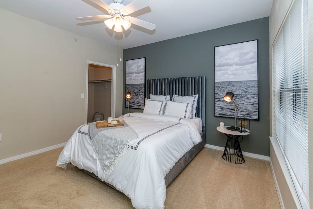 Well lit model bedroom at The Lyndon in Irving, Texas
