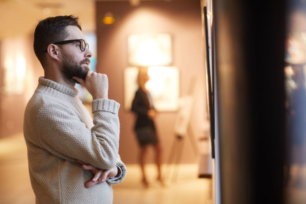 Resident visiting an art gallery near The Link Minneapolis in Minneapolis, Minnesota