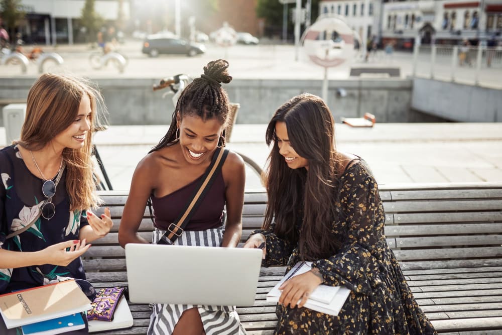 Friends chatting outside of class in Moscow, Idaho near IDENTITY Moscow