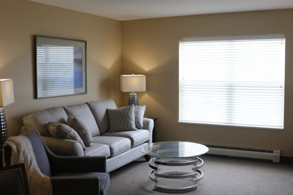 Sunlit senior apartment living room at Keelson Harbour in Spirit Lake, Iowa