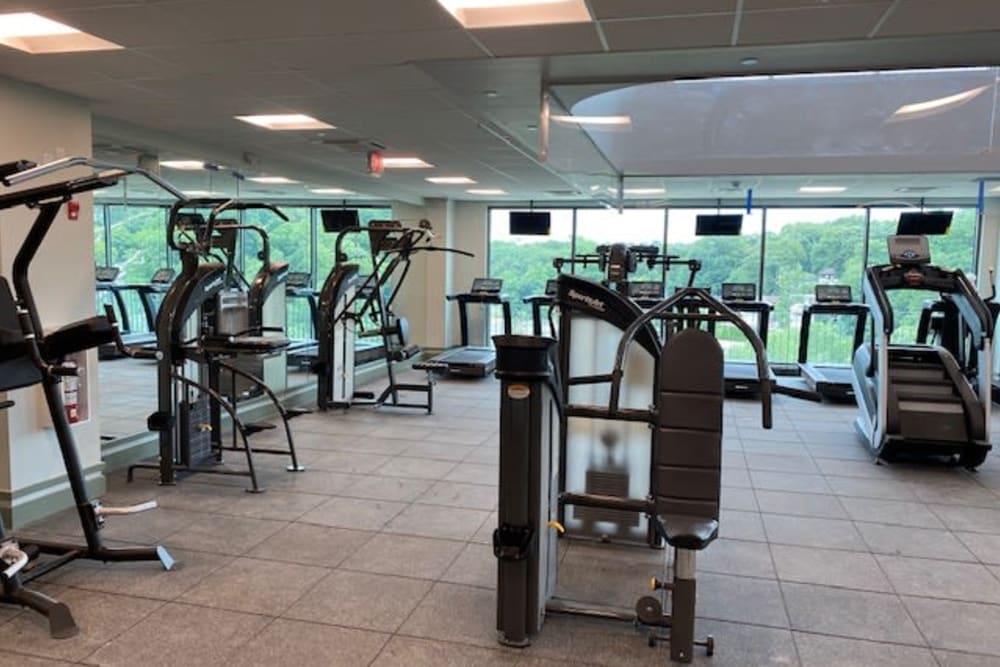 Large fitness center with big windows at Monarch at Ridge Hill in Yonkers, New York