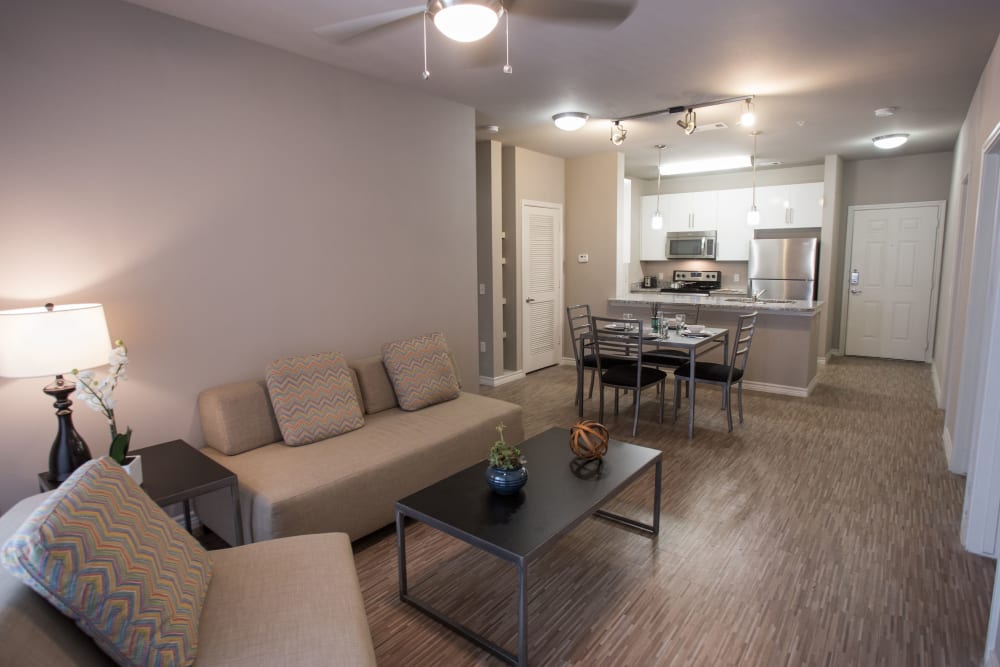 Living room with a ceiling fan at Texan 26 in Austin, Texas