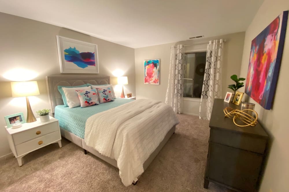 Bedroom in a model home at The Timbers at Long Reach Apartments in Columbia, Maryland