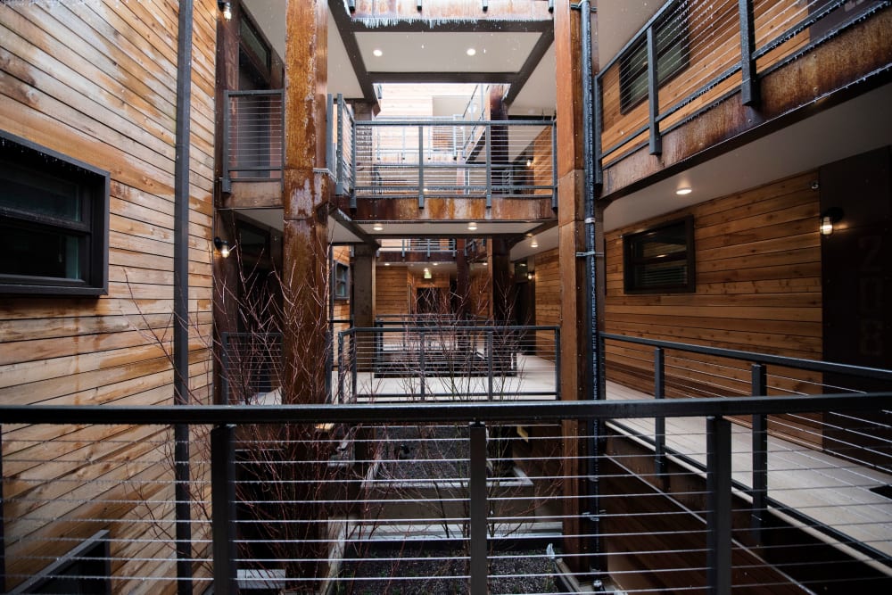 Rustic reclaimed wood siding throughout the community common areas at Brooklyn Yard in Portland, Oregon