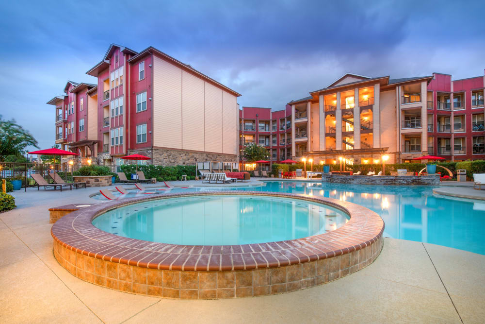 Outdoor pool and spa at Olympus Katy Ranch in Katy, Texas
