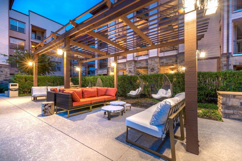 Lounge spot by the pool at Olympus Katy Ranch in Katy, TX