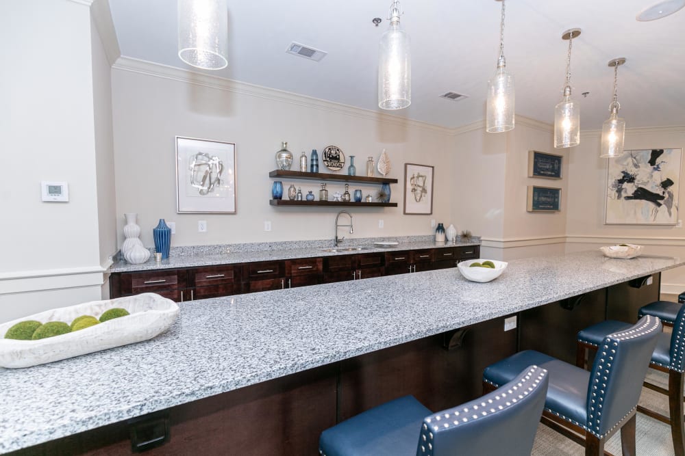 Bar area in the resident clubhouse lounge at The Station at River Crossing in Macon, Georgia