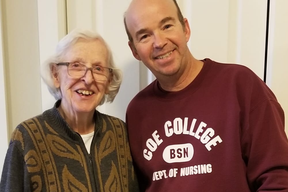 Resident with son at Emery Place in Robins, Iowa