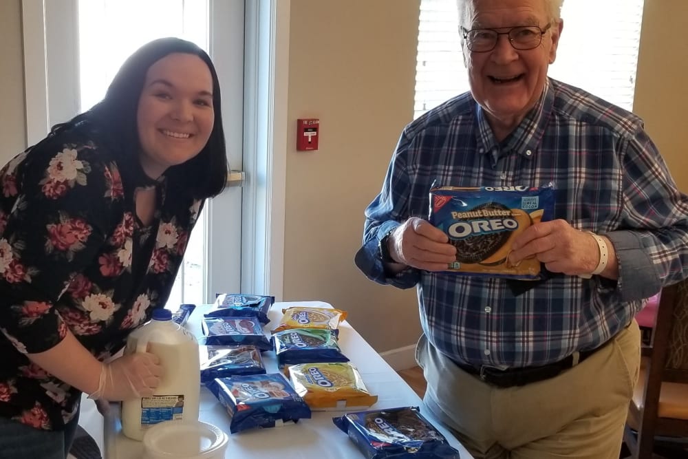 Staff and resident with cookies at Emery Place in Robins, Iowa