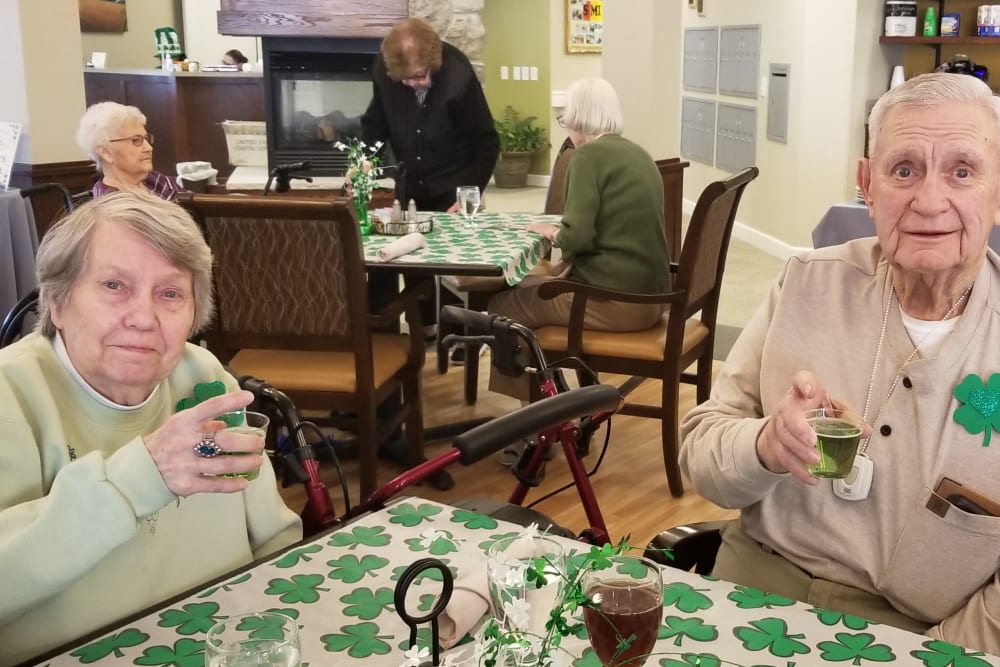 Residents celebrating St. Patrick's Day at Emery Place in Robins, Iowa