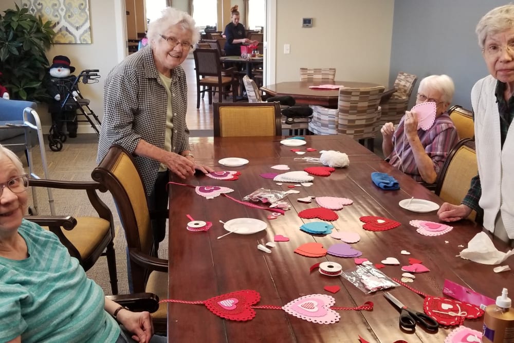 Residents celebrating Valentine's Day at Emery Place in Robins, Iowa