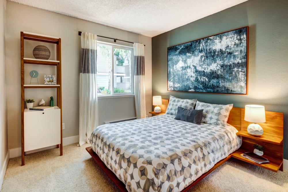 Bedroom with accent wall at Sofi Union City in Union City, California