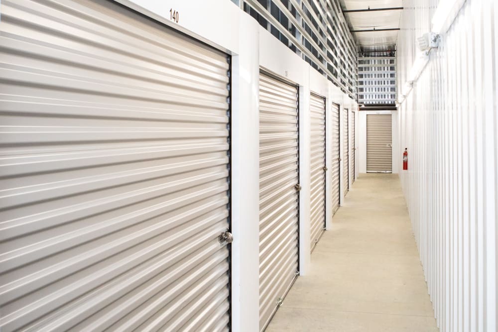 Large walkways through storage units in Jamestown, North Carolina at AAA Self Storage at Strickland Ct