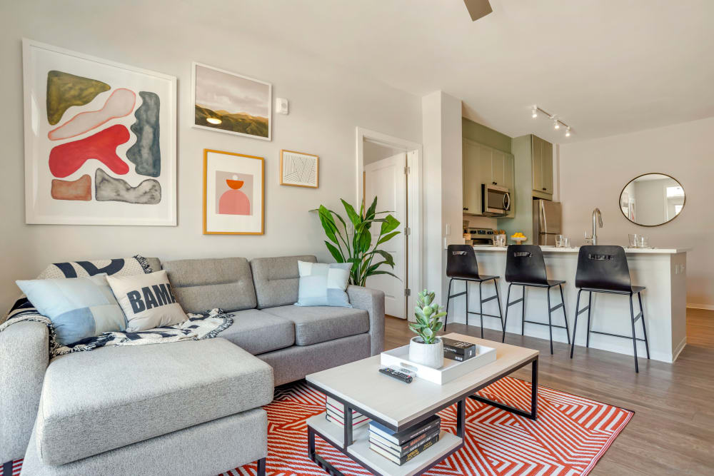 Well decorated living room at UNCOMMON Tuscaloosa in Tuscaloosa, Alabama