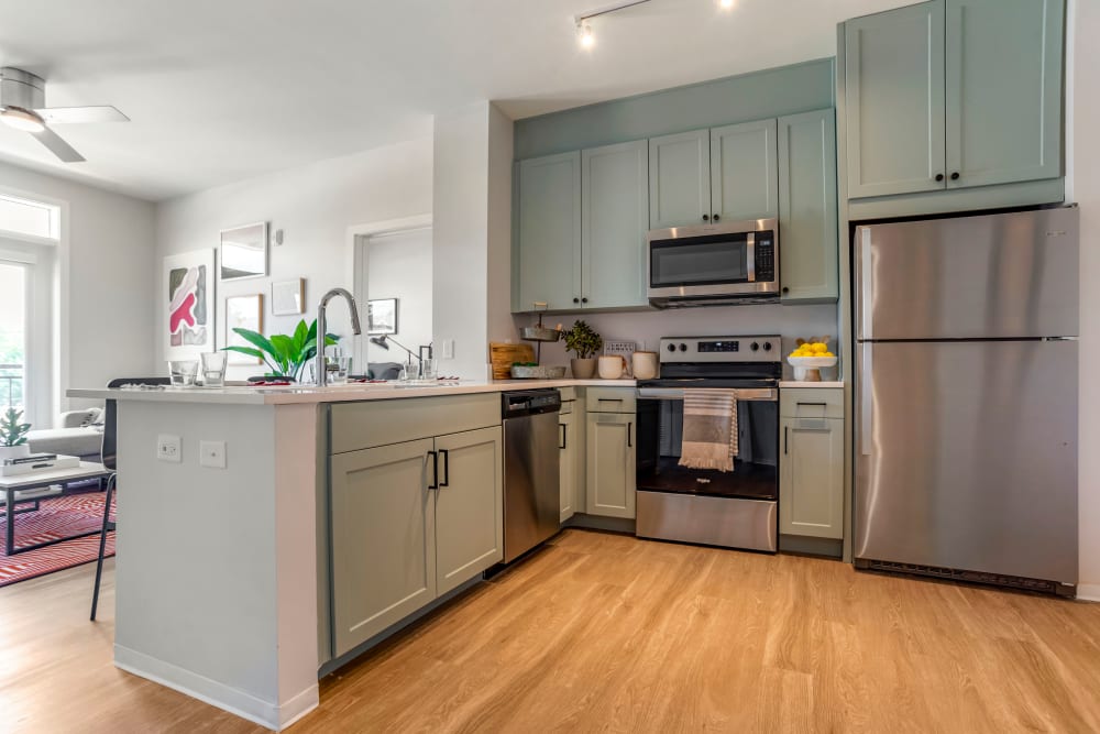 Sleek, modern kitchen at UNCOMMON Tuscaloosa in Tuscaloosa, Alabama