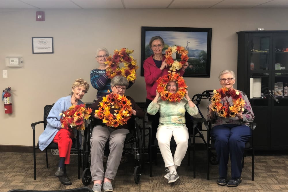 Residents displaying their wreaths at Brown Deer Place in Coralville, Iowa