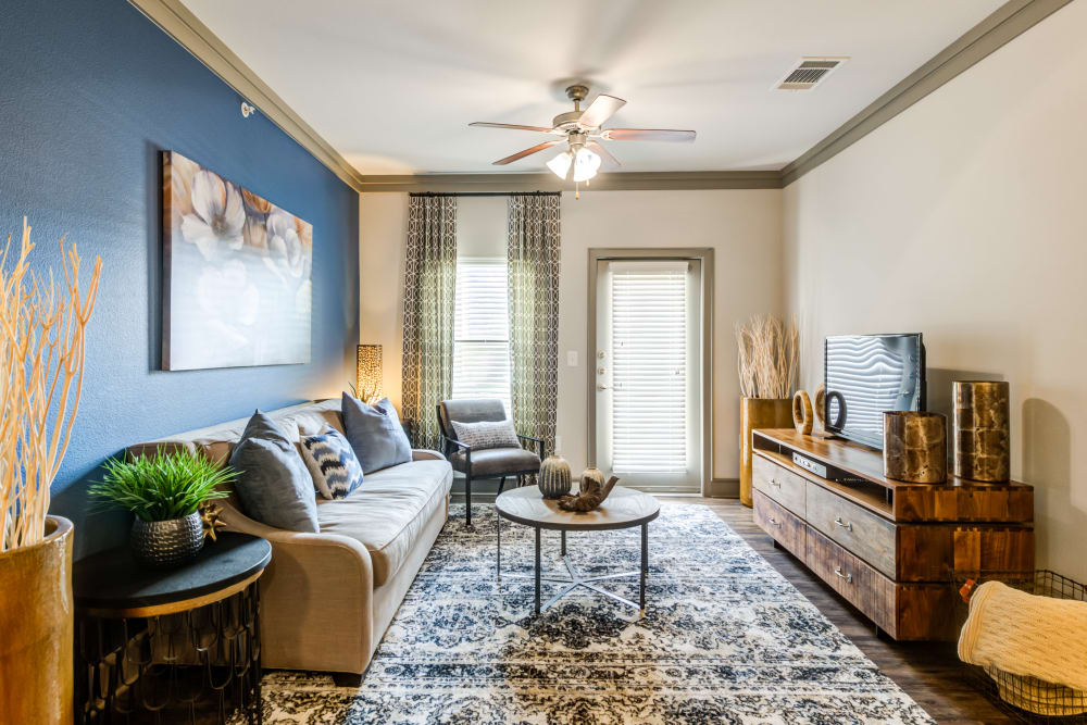 Well decorated model living room at The Sovereign in Fort Worth, Texas