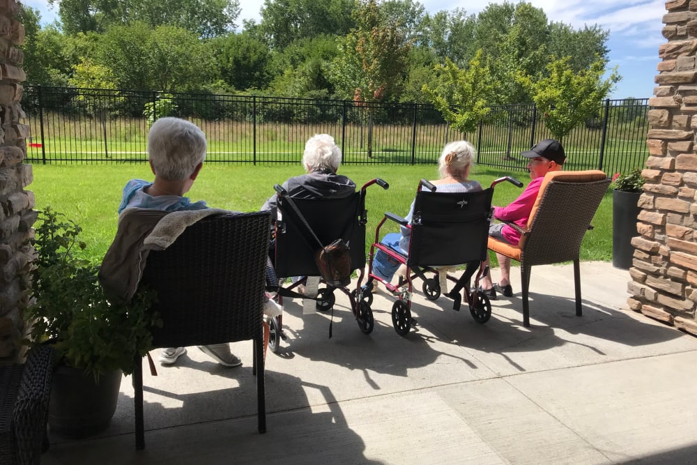 Residents enjoying fresh air at Edencrest at The Legacy in Norwalk, Iowa