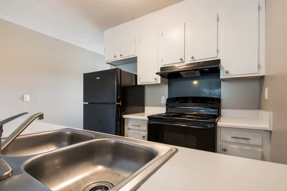 Kitchen with a stainless-steel sink at 1022 West Apartment Homes in Gaffney, South Carolina