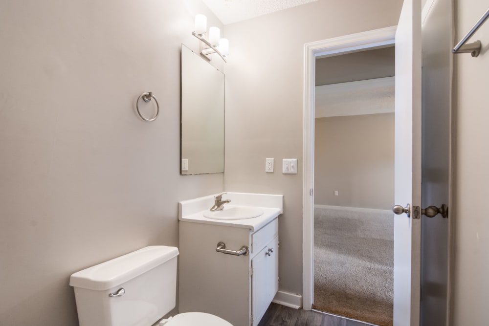 Bathroom with a vanity mirror at 1022 West Apartment Homes in Gaffney, South Carolina