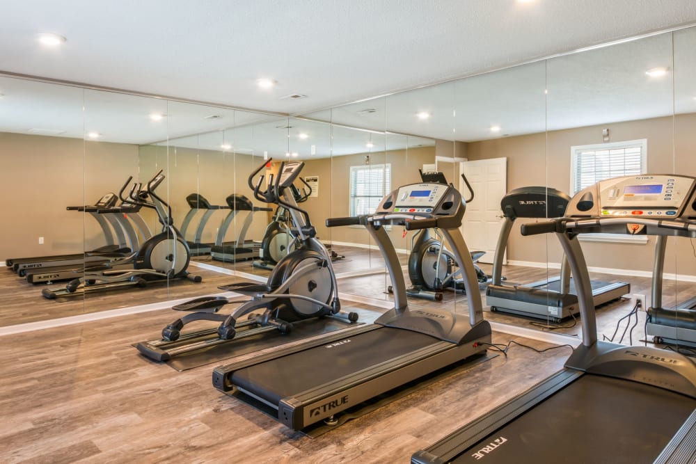 Fitness center with plenty of individual workout stations at Alexander Station Apartment Homes in Salisbury, North Carolina