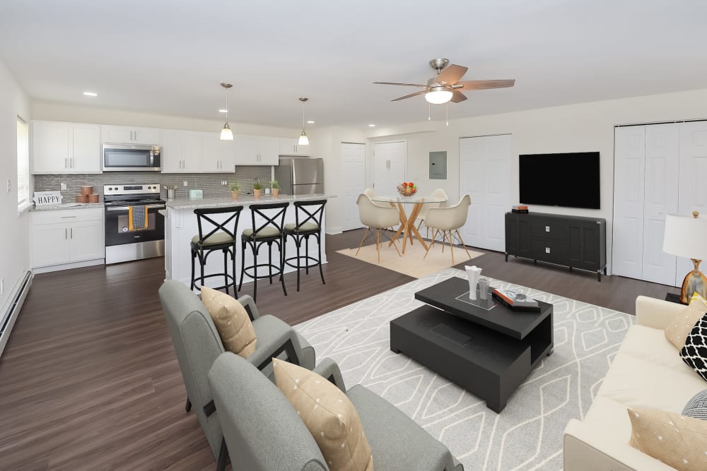 Open layout model home with vinyl plank flooring at Kingswood Apartments & Townhomes in King of Prussia, Pennsylvania