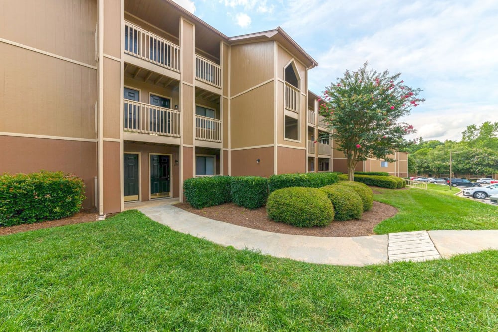 Beautifully landscape walkways at Waters Edge Apartment Homes in Concord, North Carolina