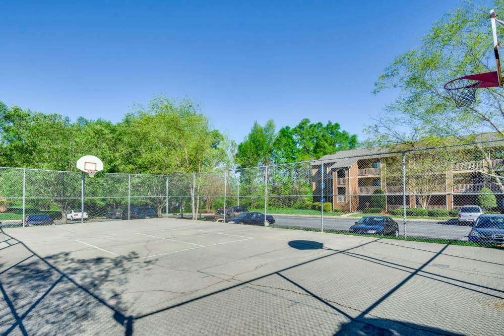Onsite basketball court at Woodbrook Apartment Homes in Monroe, North Carolina