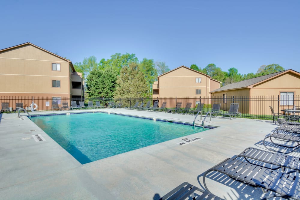 A large swimming pool for hot summer days at Woodbrook Apartment Homes in Monroe, North Carolina