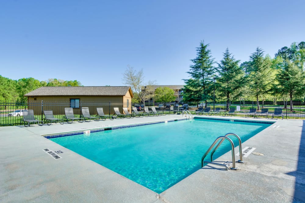 A large swimming pool for Saturdays at Woodbrook Apartment Homes in Monroe, North Carolina