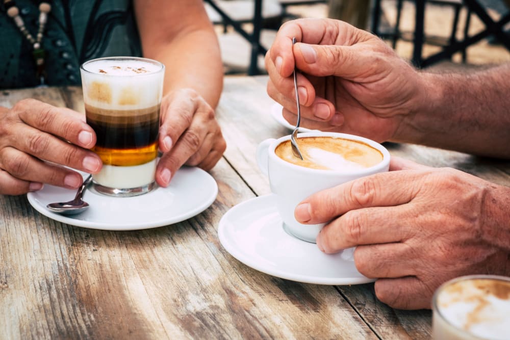 Residents enjoying coffee at The Meridian at Brandon in Tampa, Florida