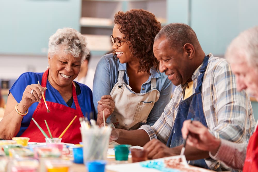 Residents enjoying a craft session at The Meridian at Brandon in Tampa, Florida