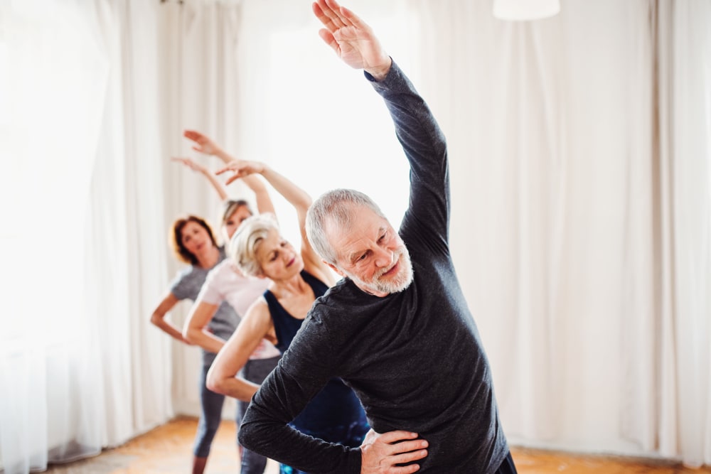Residents stretching at The Meridian at Brandon in Tampa, Florida