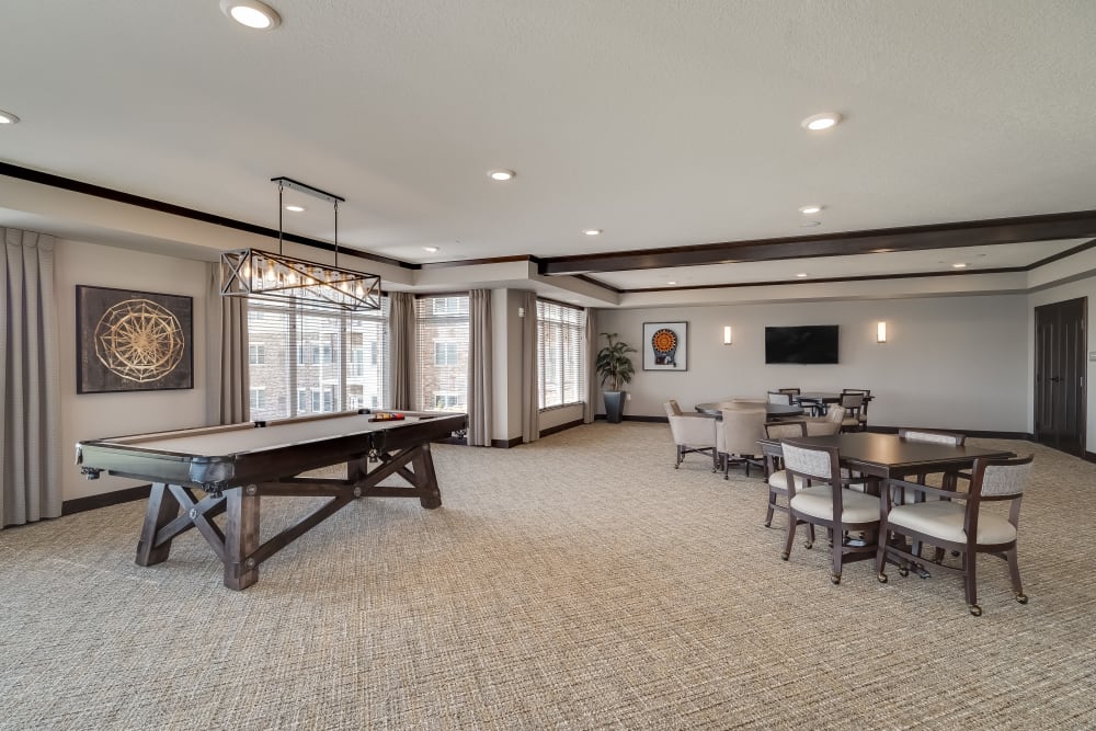 Game Room with Billiards Table at Applewood Pointe of Maple Grove at Arbor Lakes in Maple Grove, Minnesota