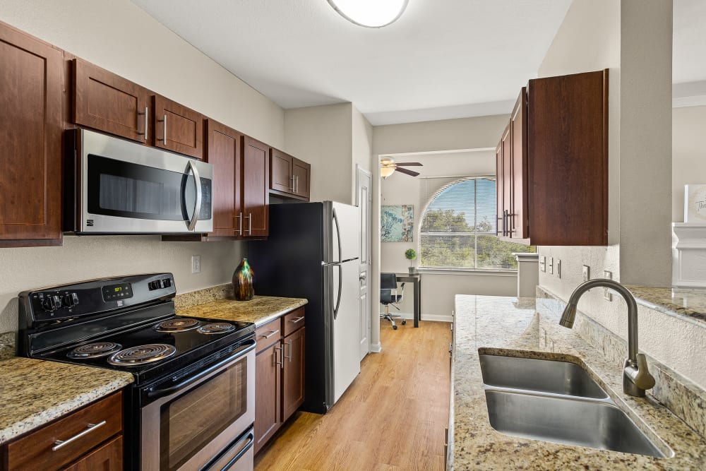 Kitchen with stainless steel appliances at Sedona Ranch