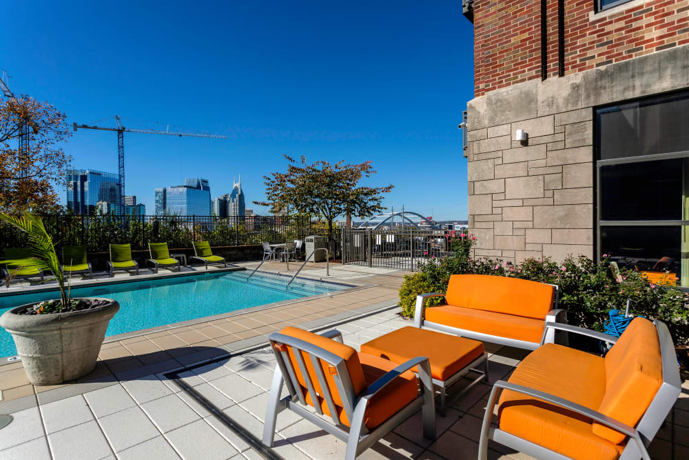 Beautiful poolside seating at City View Apartments in Nashville, Tennessee