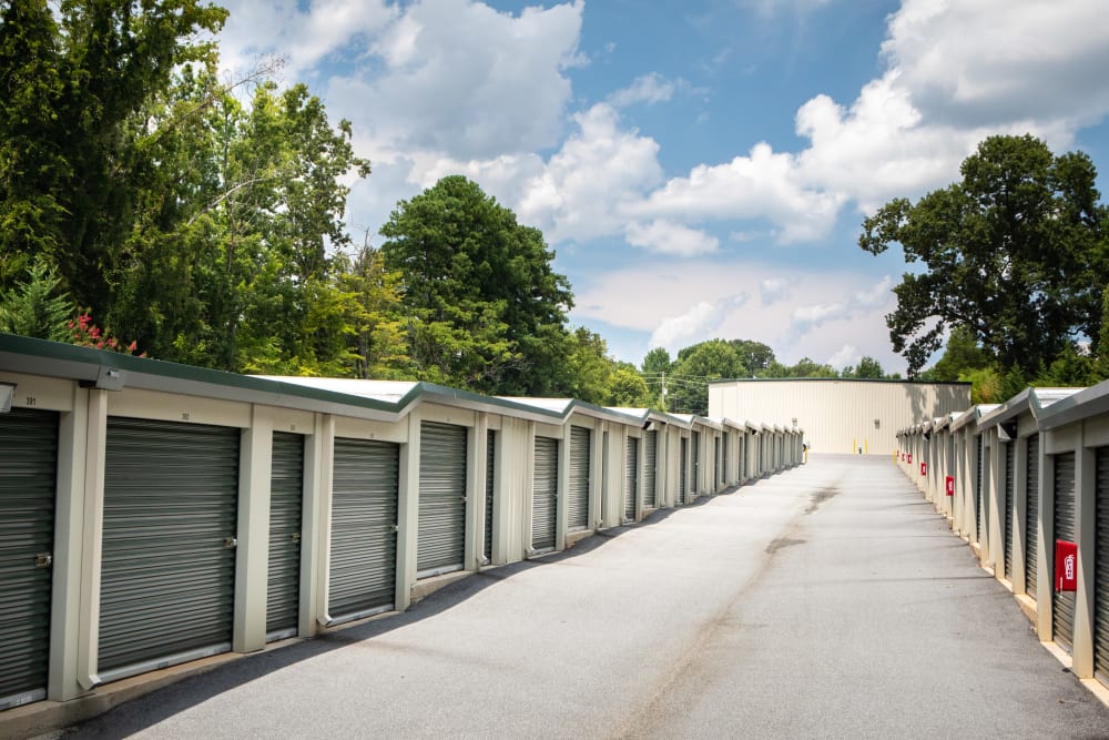 outdoor units with green doors at AAA Self Storage at W Friendly Ave in Greensboro, North Carolina