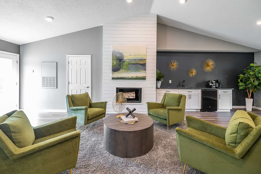 Resident clubhouse with a fireplace at Wexford Apartment Homes in Charlotte, North Carolina