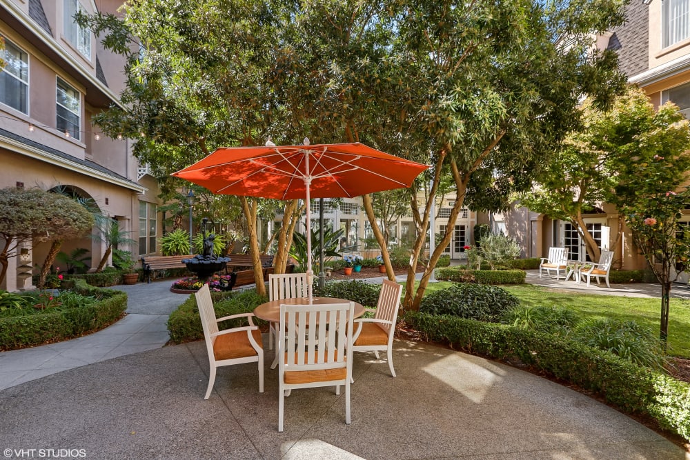 Outdoor seating at Sunshine Villa, A Merrill Gardens Community in Santa Cruz, California