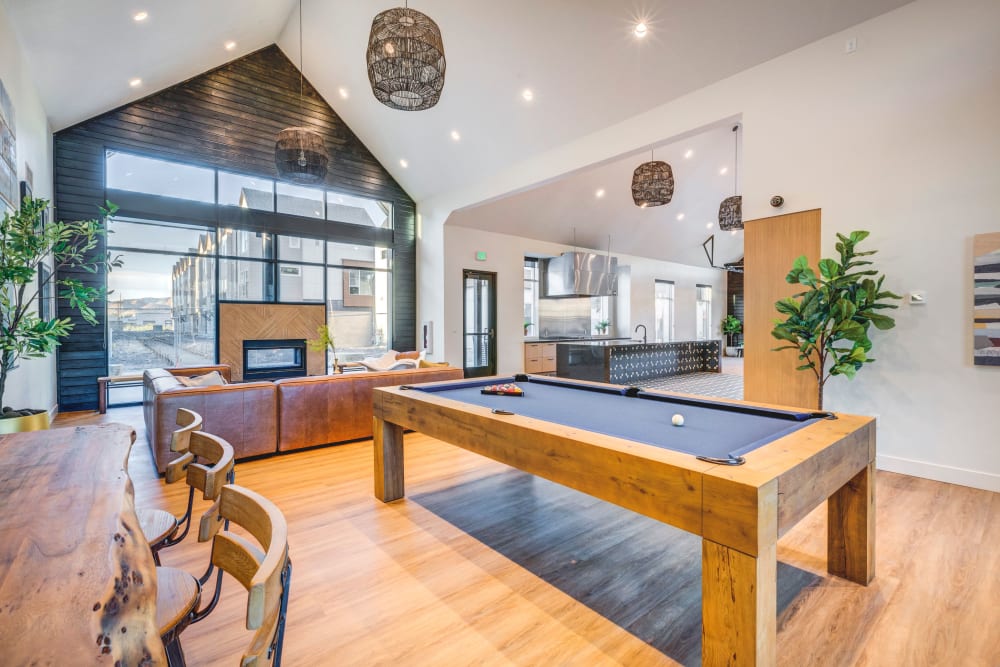 Clubhouse with a billiards table at Hawthorne Townhomes in South Salt Lake, Utah