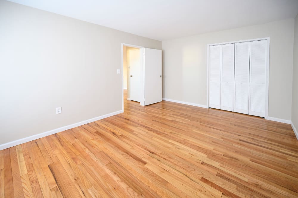 Living room with hardwood floors at Lafayette Park Apartments in Hawthorne, New Jersey