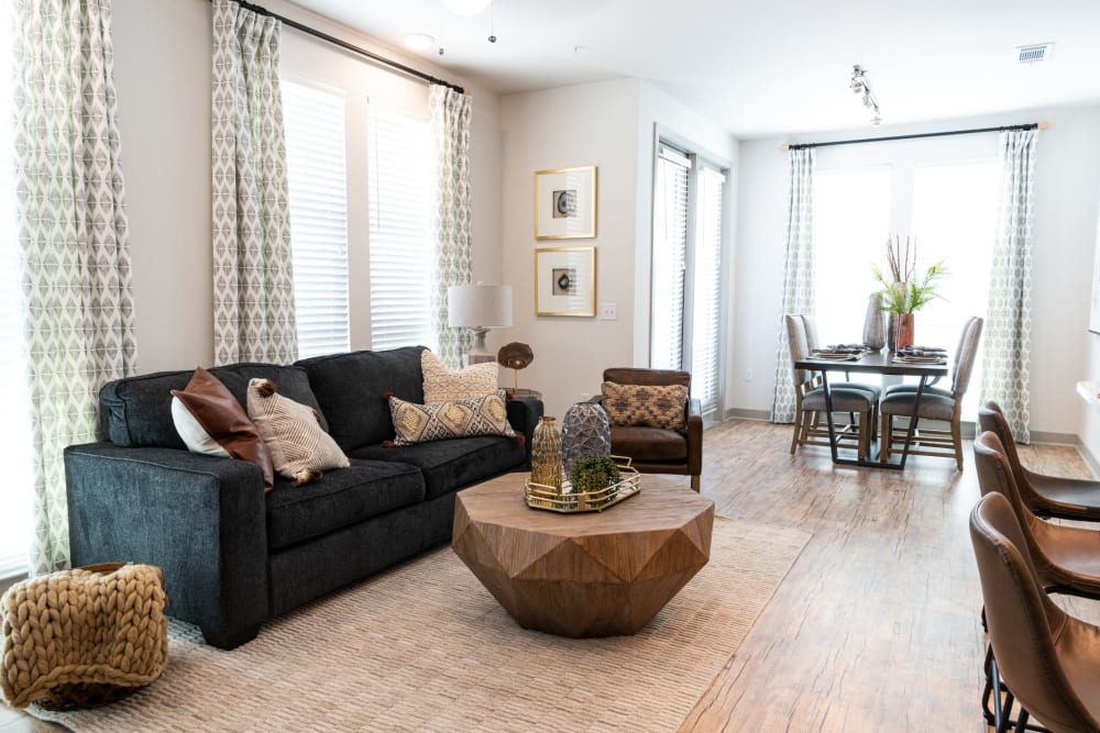 Living room with patio access at Shelby at Northside in Fort Worth, Texas