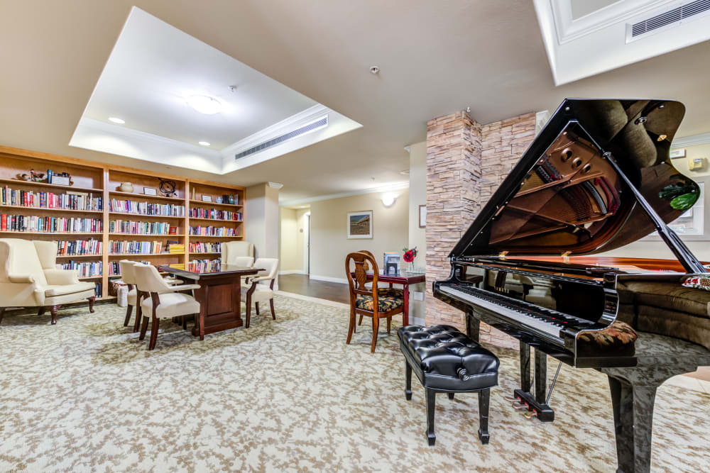 Library with a piano at Cypress Place, Ventura in CA