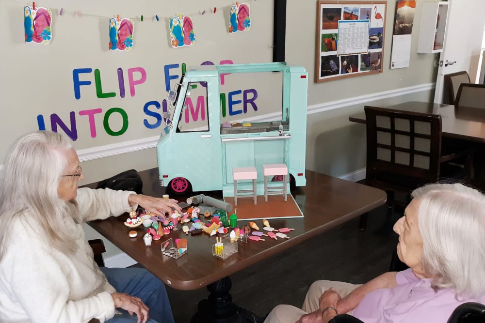 Residents play memory games to sharpen their skills at Corridor Crossing Place in Cedar Rapids, Iowa