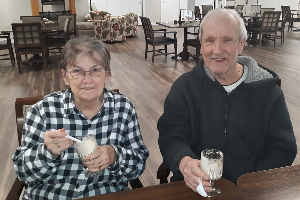 Resident couple have snacks and beverages at Corridor Crossing Place in Cedar Rapids, Iowa