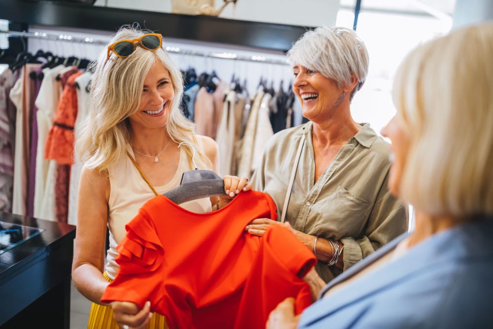 Friends clothes shopping together in Atlanta, Georgia near 17th Street Lofts
