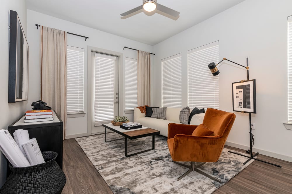 Bright well decorated living room at Magnolia on the Green in Allen, Texas