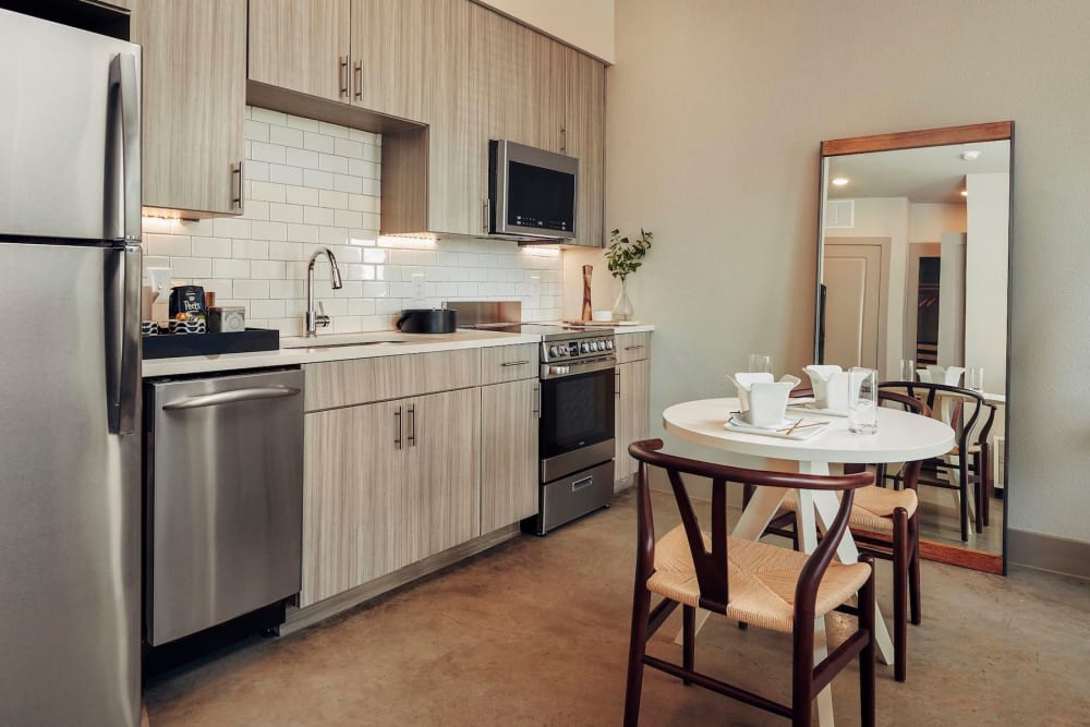 Stainless-steel appliances in a model home's kitchen at The Guthrie in Austin, Texas